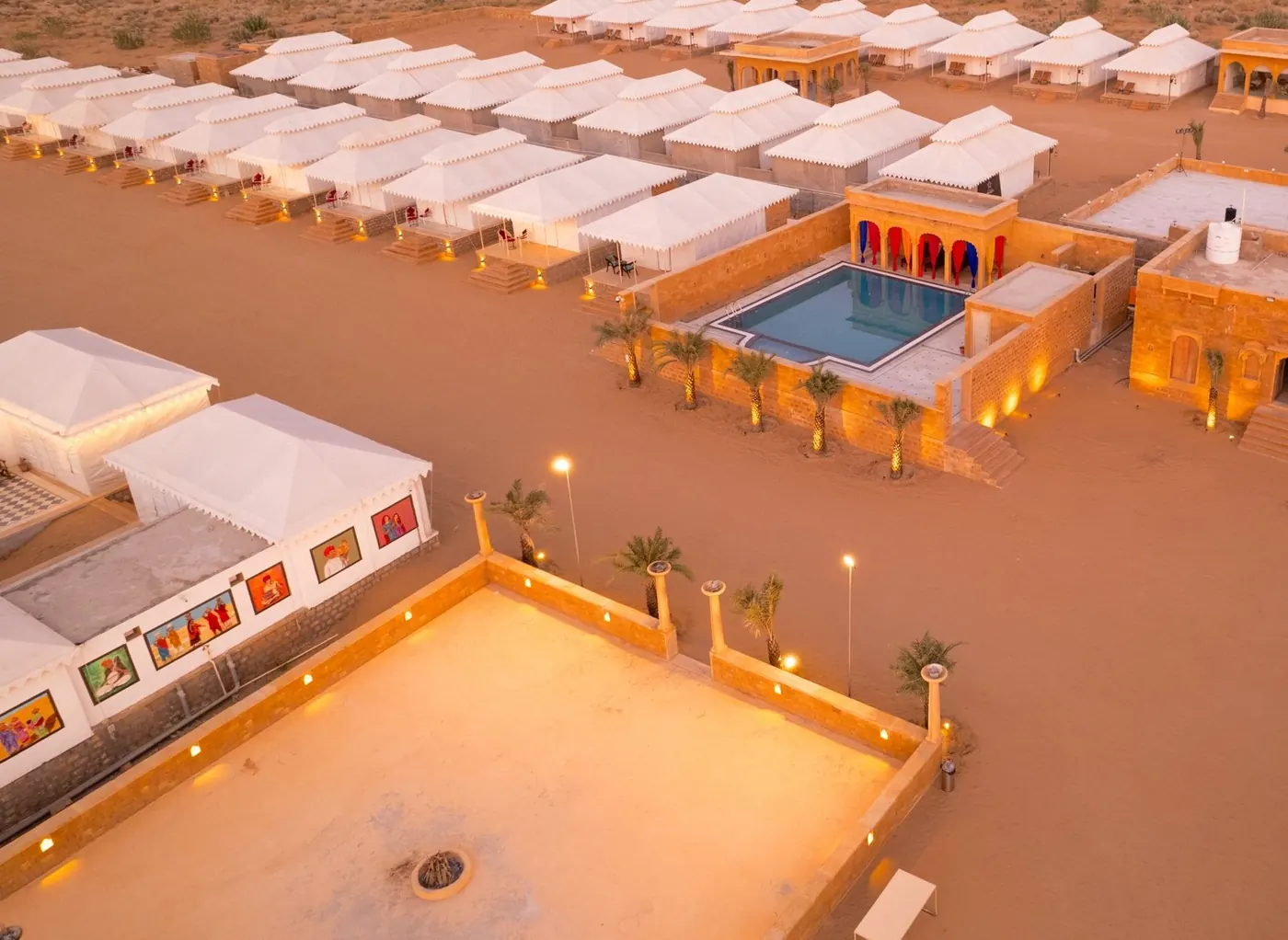 Aerial view of the camp with the pool among the tents